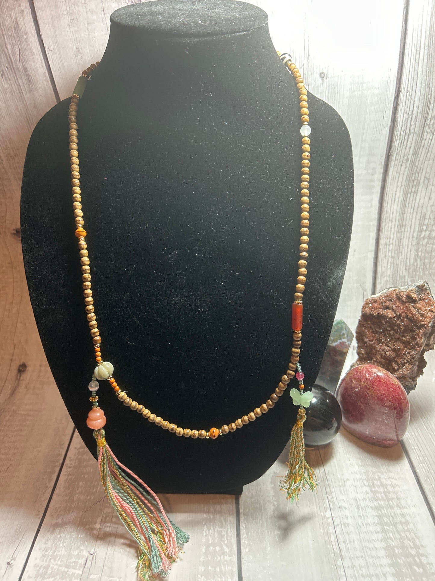 Two tassel wooden bead crystal mix necklace